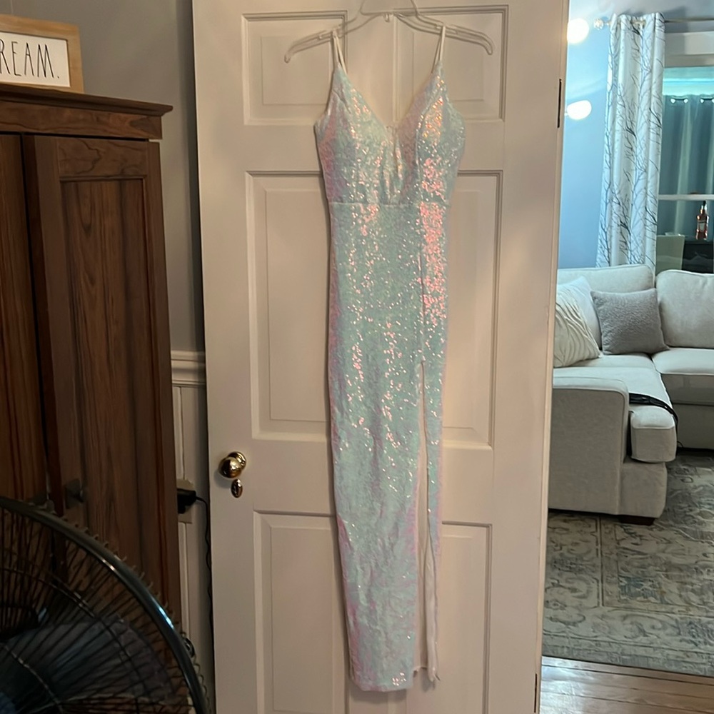 Long sequence dress with slit on left side, never worn